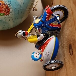 Vintage tin wind up motorcycle toy